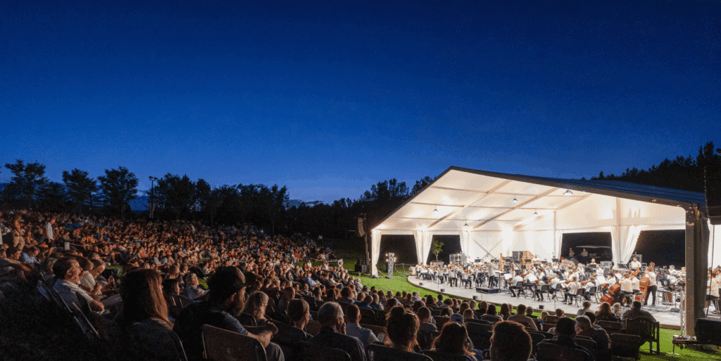 Vibrant music stage at Dusk Festival with crowd enjoying the performances in the year