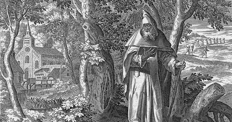 Black and white engraving of a robed, bearded man with a staff and book in a wooded area. In the background is a church on one side.